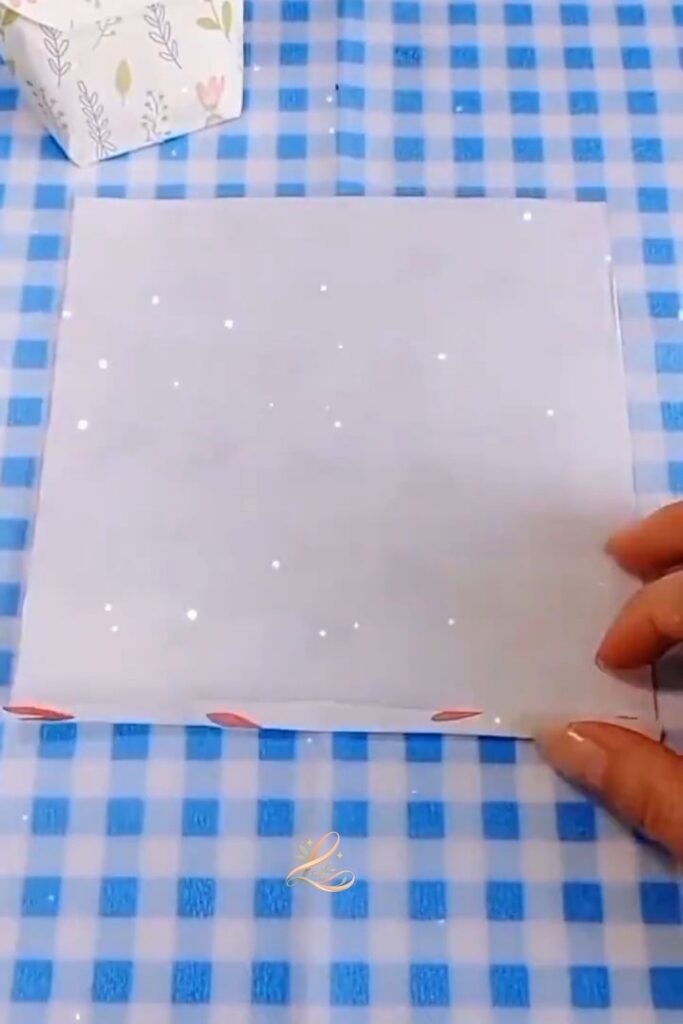 Fold the Paper in Half Lengthways