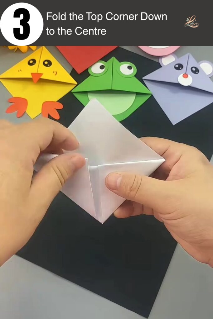 Fold the Top Corner Down to the Centre