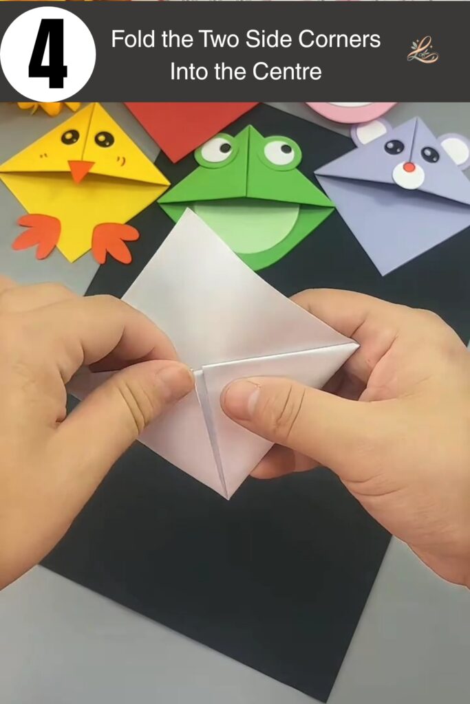 Fold the Two Side Corners Into the Centre