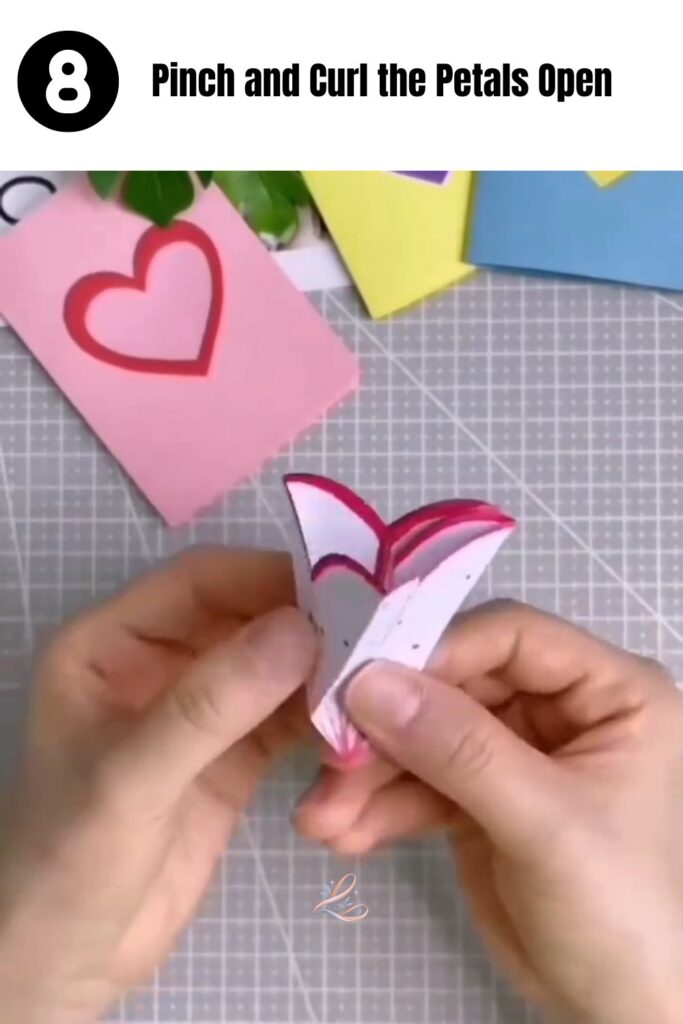 Step 8 - Pinch and Curl the Petals Open