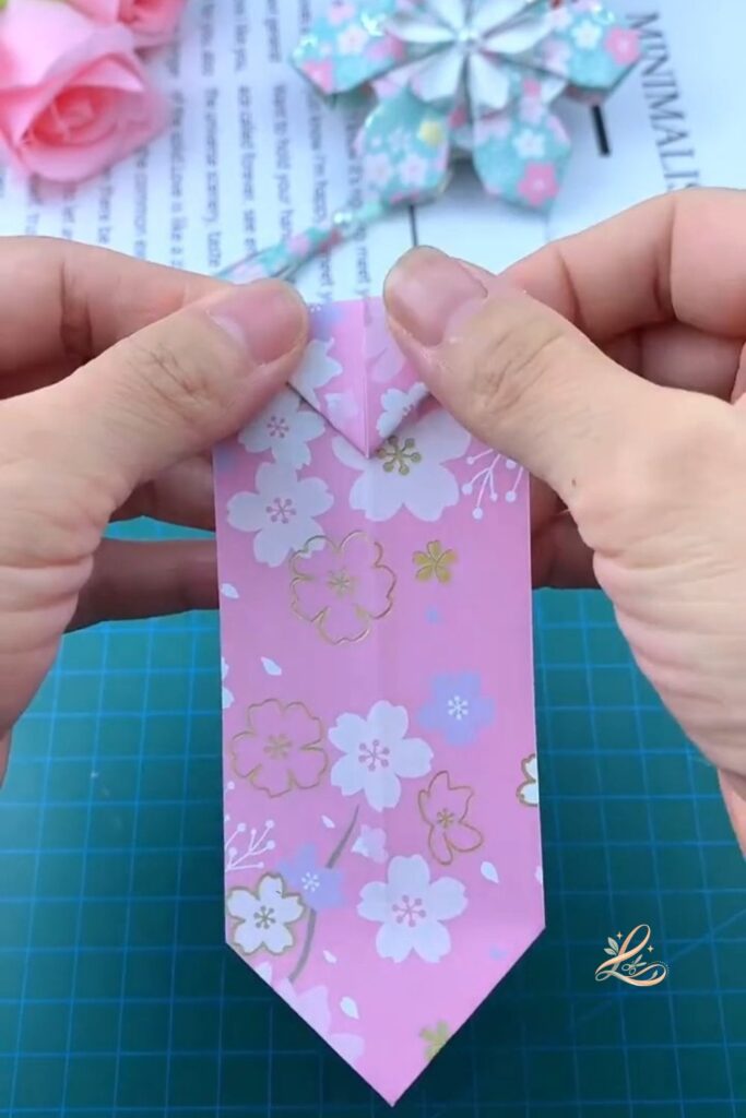 The module held with the patterned side facing forward after the top flap fold