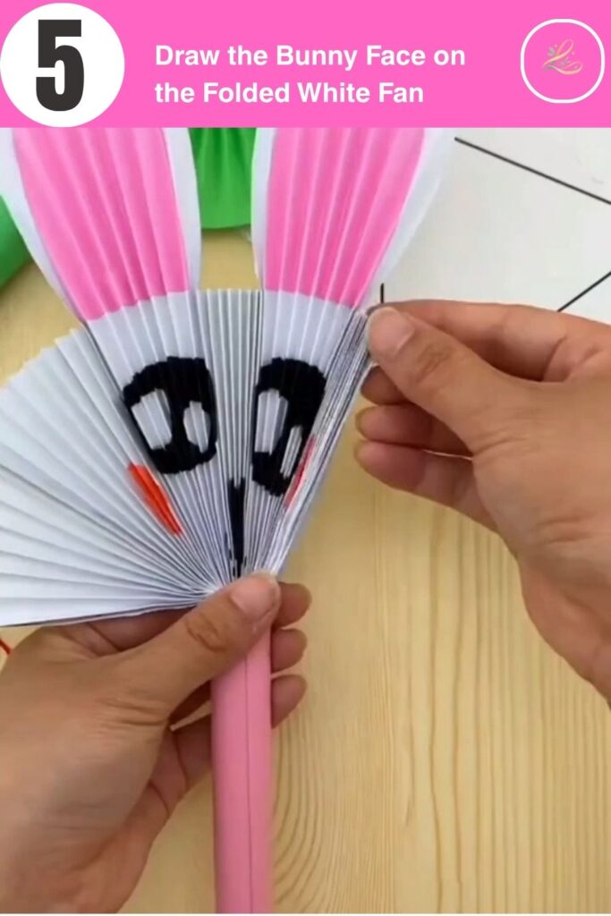 Draw the Bunny Face on the Folded White Fan