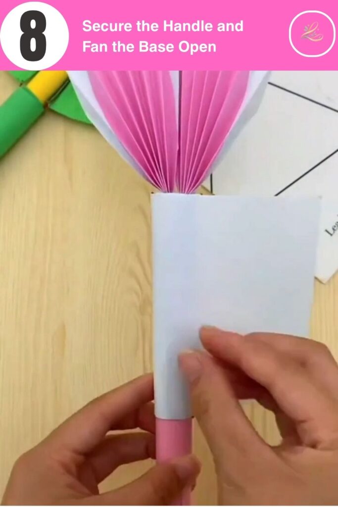 Secure the Handle and Fan the Base Open