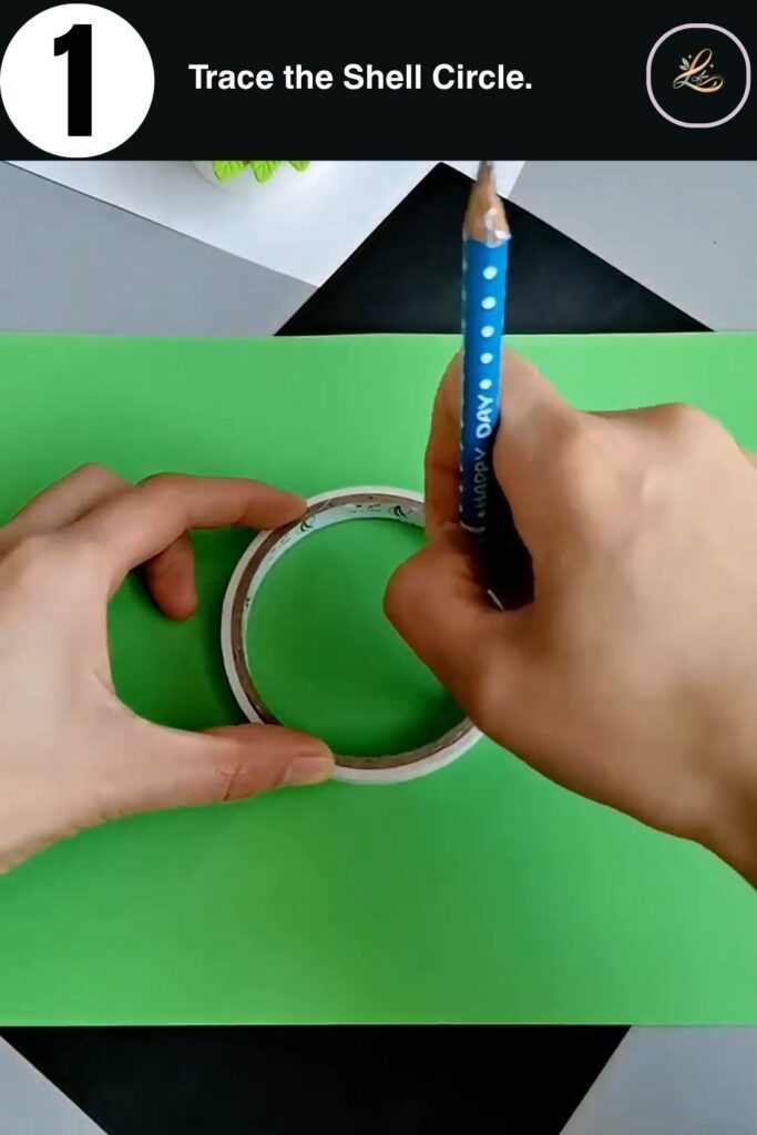 Hands tracing a circle onto green cardstock using a jar lid as a template for a DIY paper snail craft