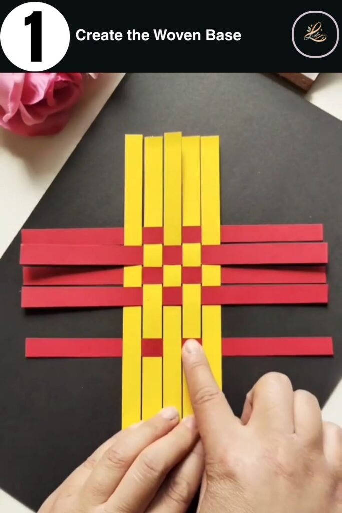 A 4x4 woven square made of yellow and red paper strips.