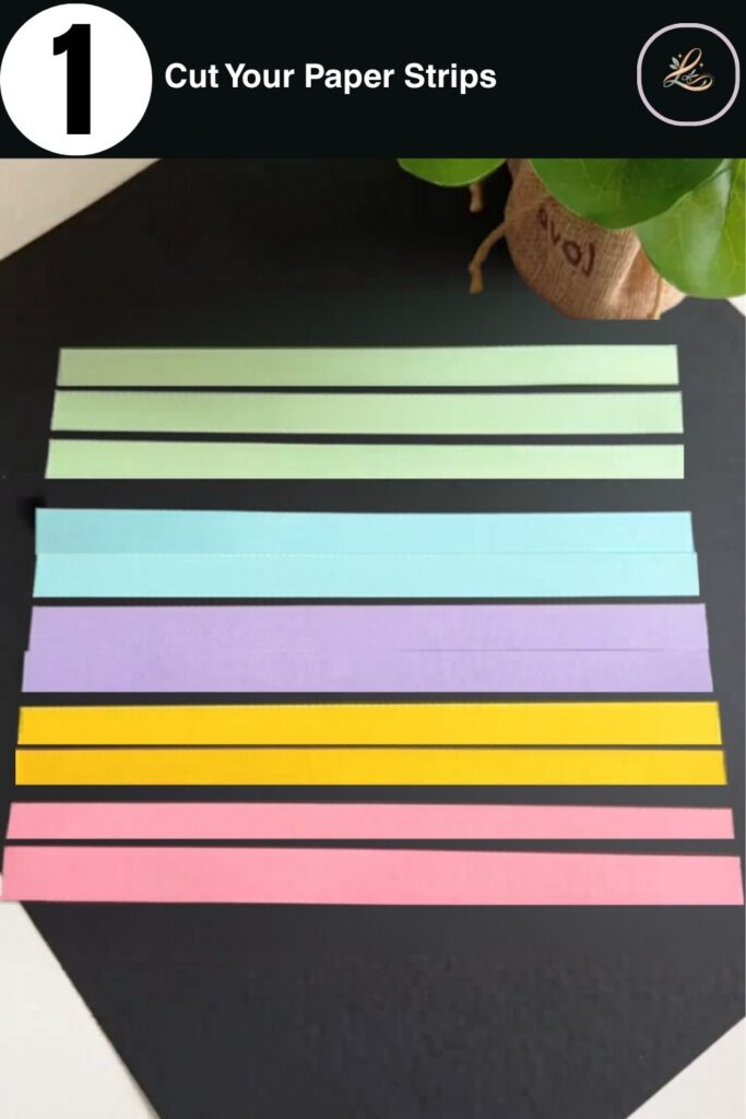 Pastel paper strips cut to size for a paper bag craft for kids, showing mint green, pink, teal, purple, and yellow strips laid flat on a dark background