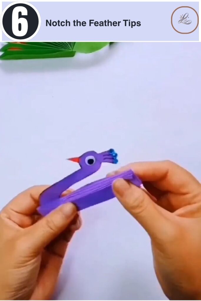 Colorful Paper Peacock Craft Anyone Can Make Trimming the edges of a folded paper bundle to make pointed tips.