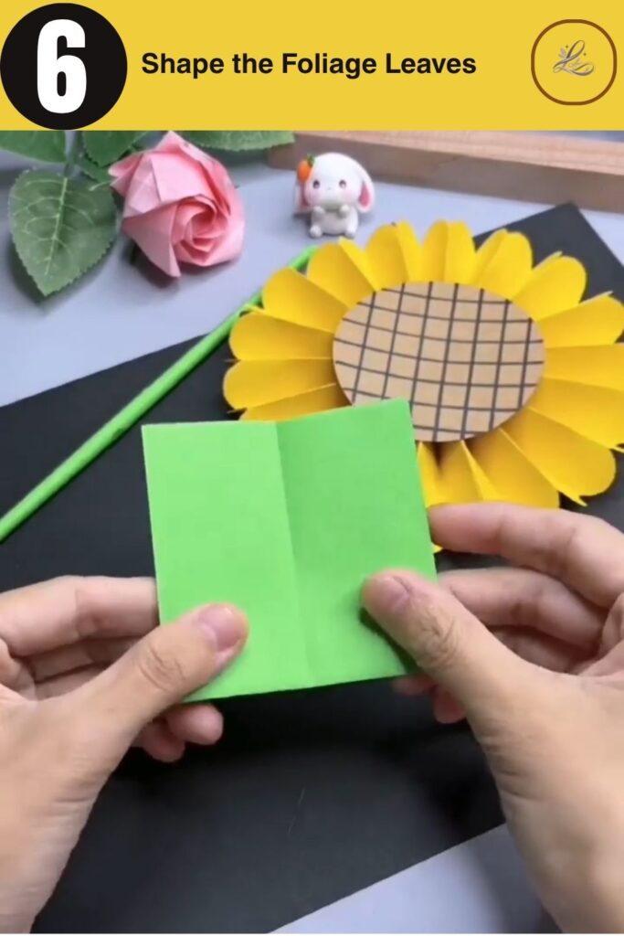 Bright Paper Sunflower Bouquet Anyone Can Make Cutting symmetrical green leaves out of paper.
