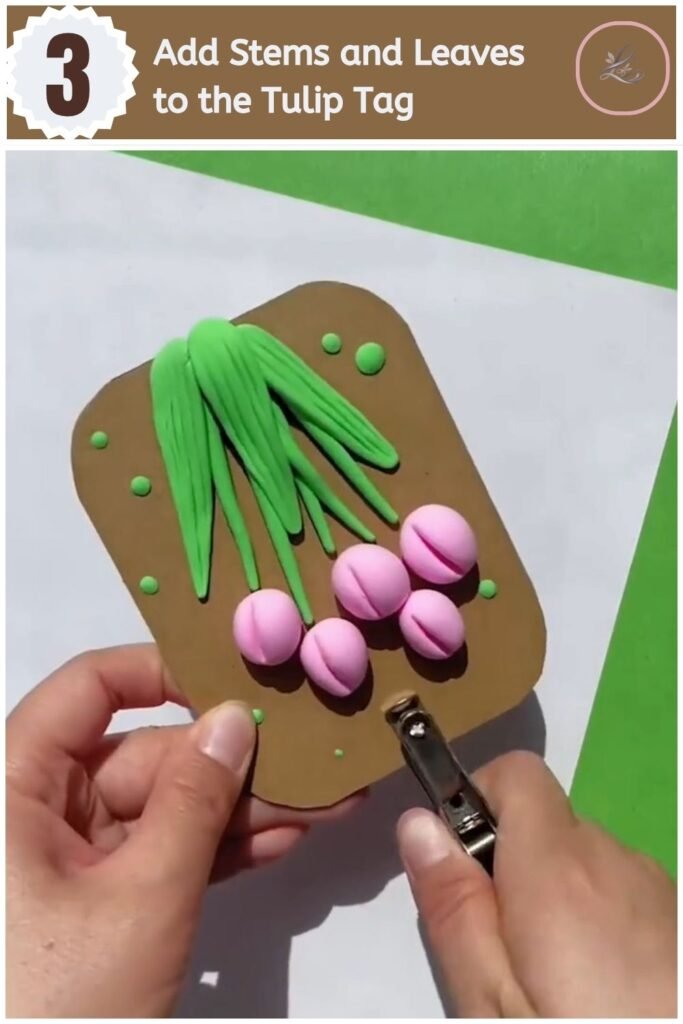 Beautiful Air Dry Clay Flower Wall Decor for Beginners Adding textured green clay stems and leaves to a tulip flower wall tag