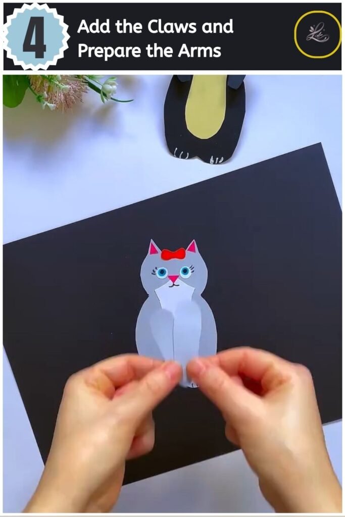 Cute Paper Cat Peekaboo Toy Step by Step Crafting the paper arms and drawing claws on the paper cat body.