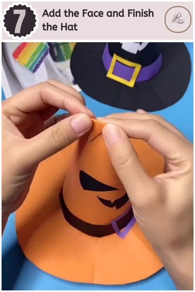 Adorable Halloween Paper Hat Craft for Beginners Finished Halloween paper witch hat craft with jack-o'-lantern face and purple buckle