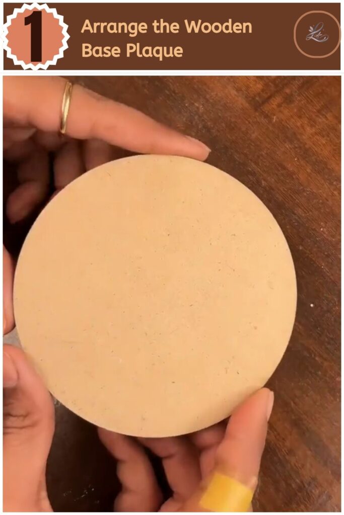 Cute DIY Inspirational Wall Hanging Anyone Can Make A crafter holding several wooden craft sticks over a round MDF circle base.