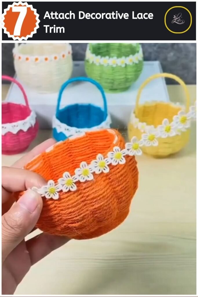 Gluing a white floral lace ribbon rim to the top edge of an orange woven basket.