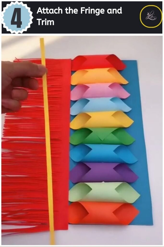 Beautiful Handmade Paper Lantern Craft Gluing a red fringe piece and a yellow paper strip trim onto the edge of the lantern base.