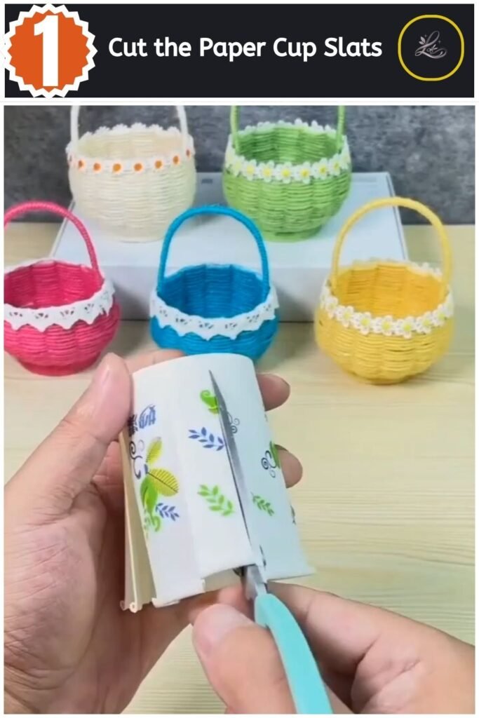 Cutting vertical slats into a white patterned paper cup with scissors.