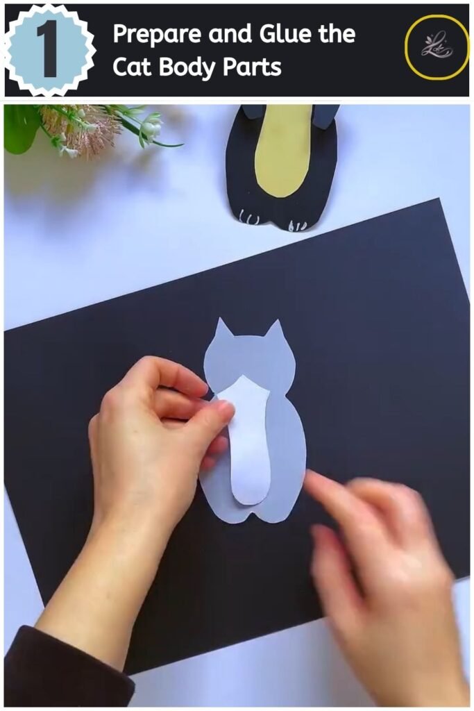 Cute Paper Cat Peekaboo Toy Step by Step Gluing a white paper belly piece onto a grey paper cat cutout.