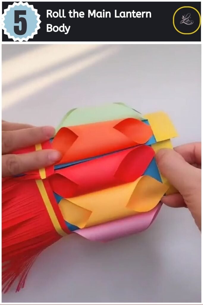 Beautiful Handmade Paper Lantern Craft Curving the blue base sheet into a cylinder to form the main lantern body shape.