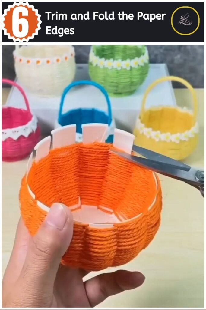 Trimming the top paper edges of the woven yarn basket with scissors.