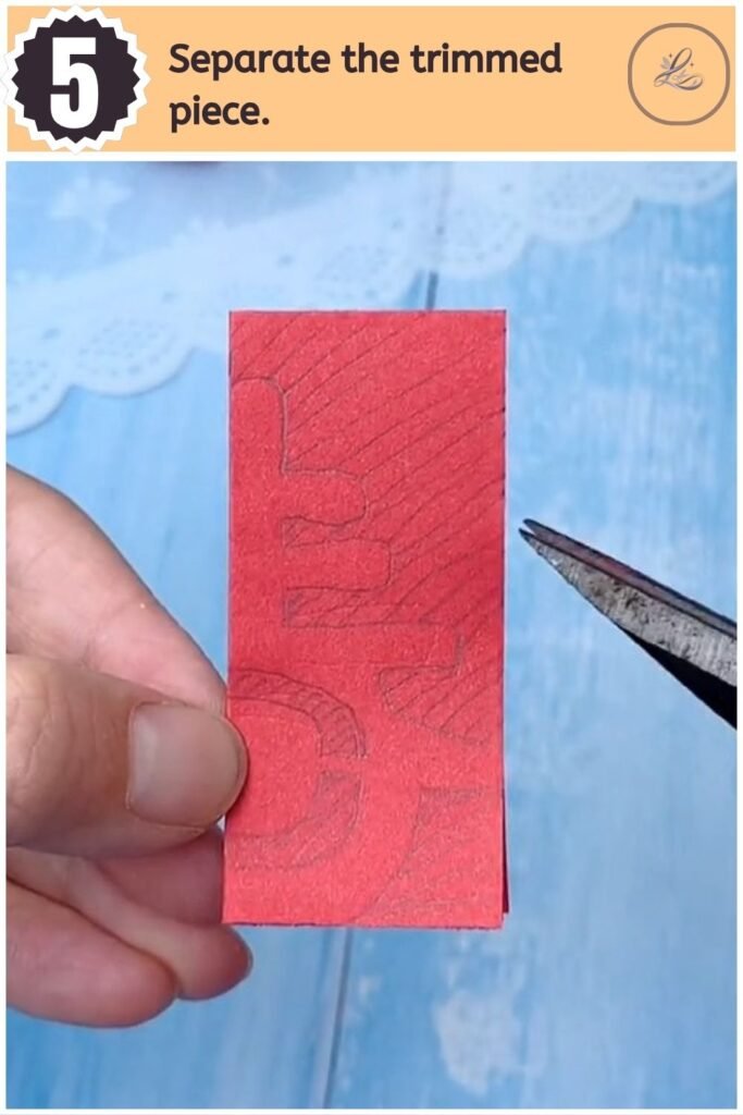 Cut paper shape of the Chinese Spring character held in hands.