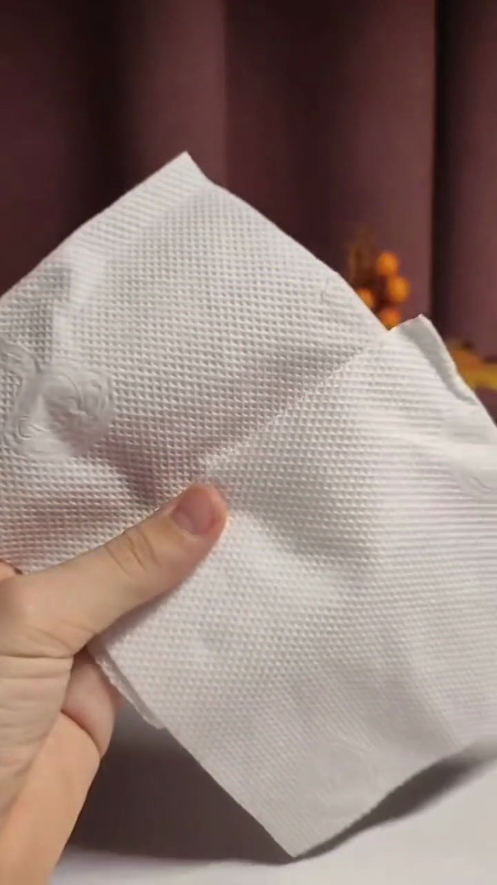 Easy DIY Paper Towel Ghosts (5-Minute Halloween Craft) Crumpling paper towel into a tight ball for ghost head